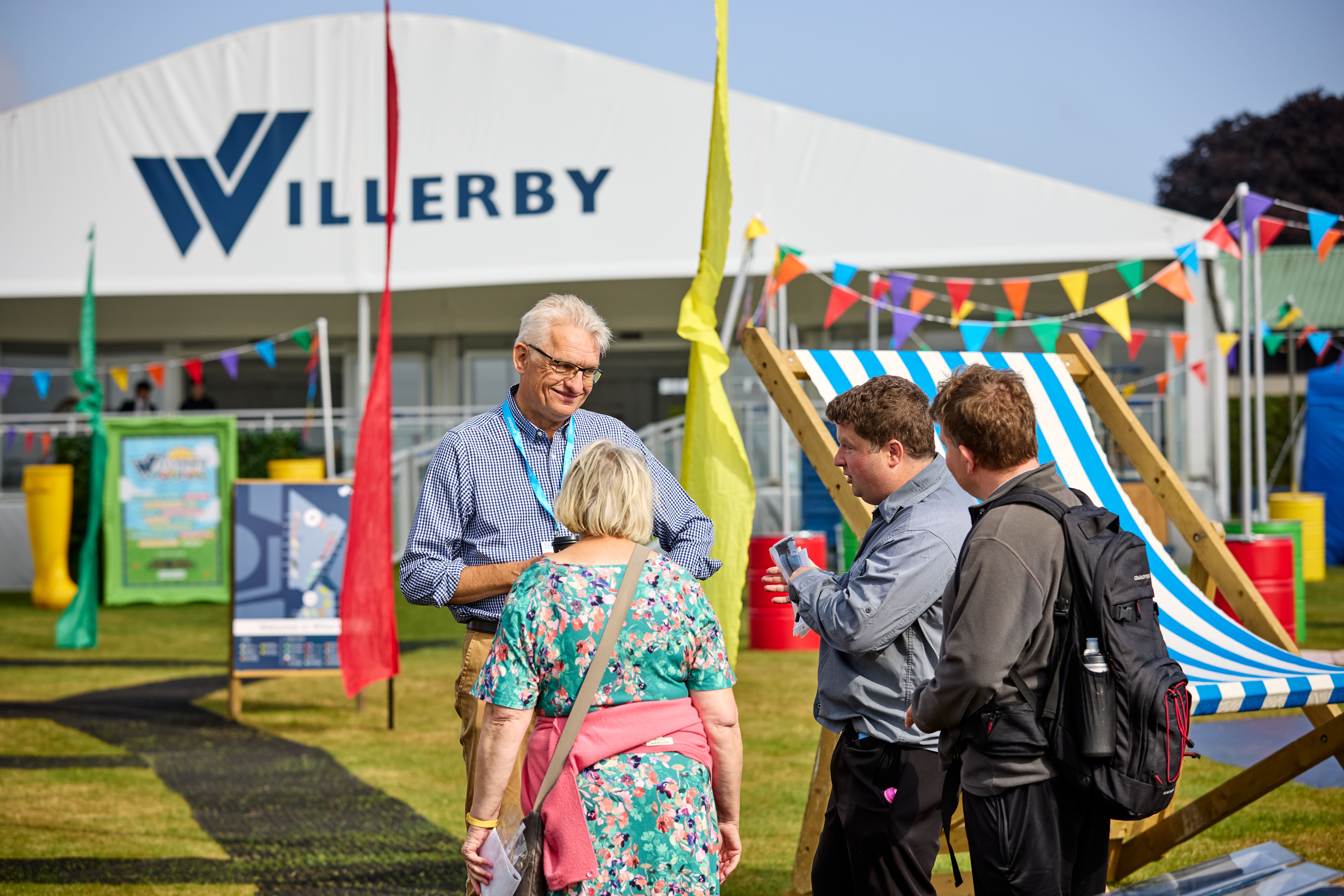 Peter Munk, CEO at Willerby, speaking with customers on the first day of the Great Caravan Motorhome & Holiday Home Show