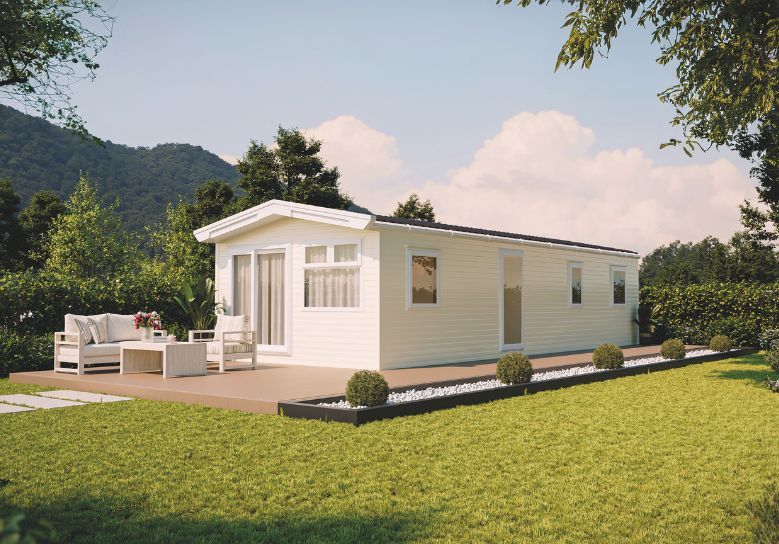 The Willerby Rio exterior in light cream sited on a secluded grassy field.