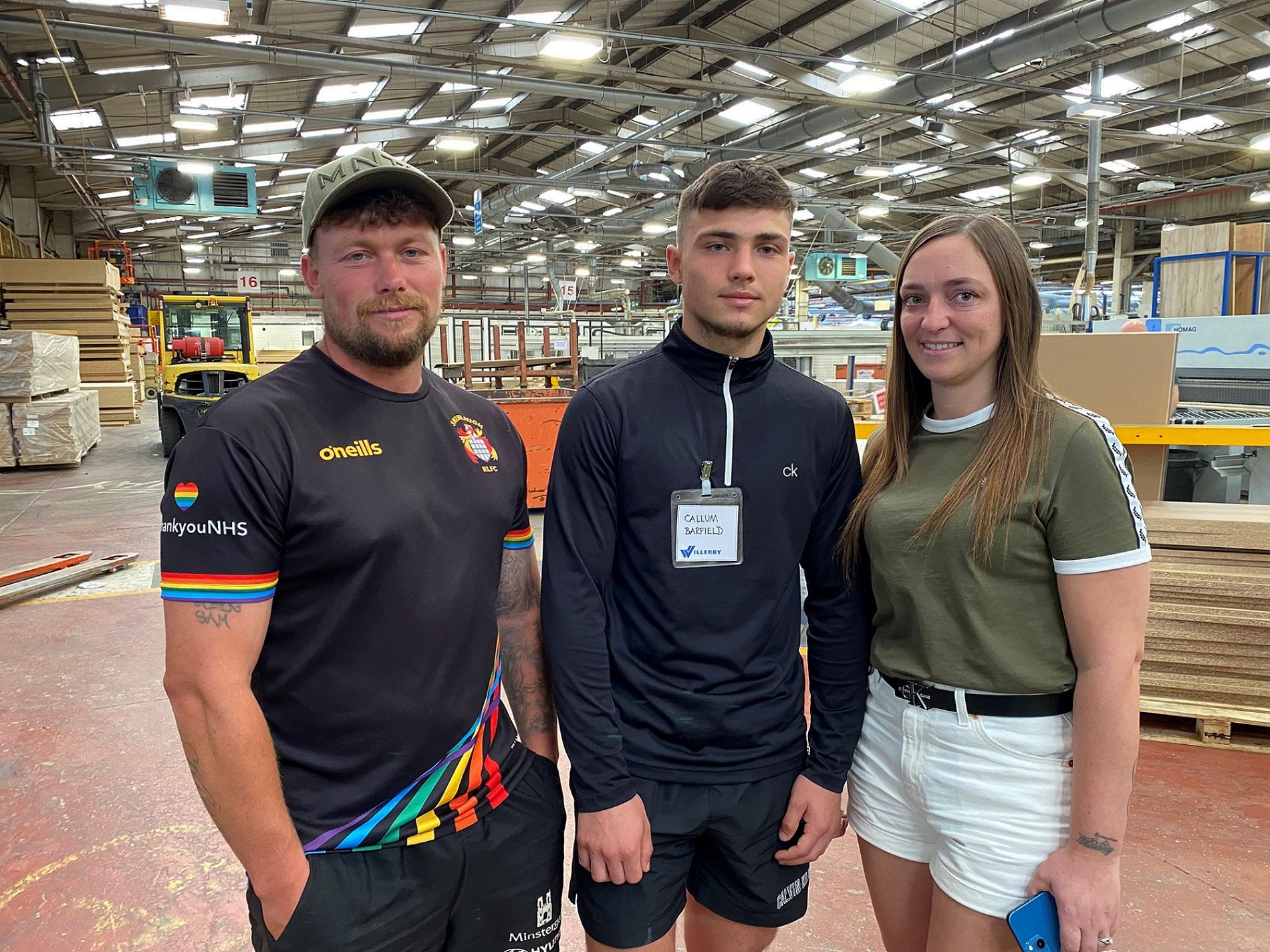 Callum Barfield with parents Sam and Kirsty.jpg