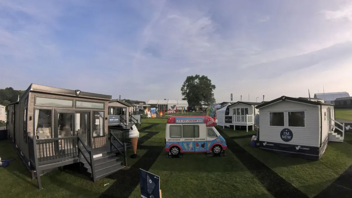 The Willerby Village at the Great Holiday Home Show in Harrogate. As well as several static caravans and lodges there is an ice cream van in the centre of the frame. 