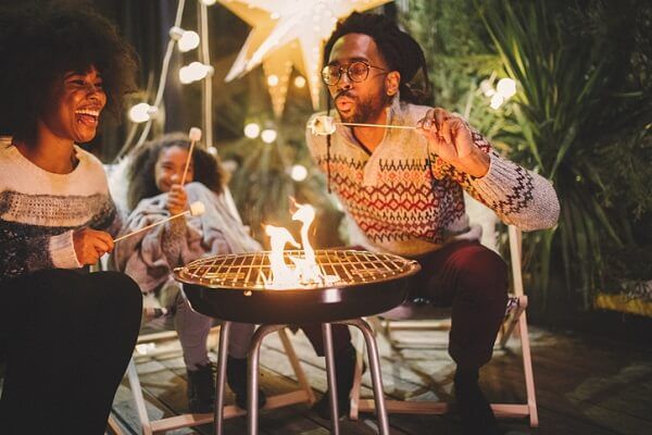 family toasting marshmallows.jpg