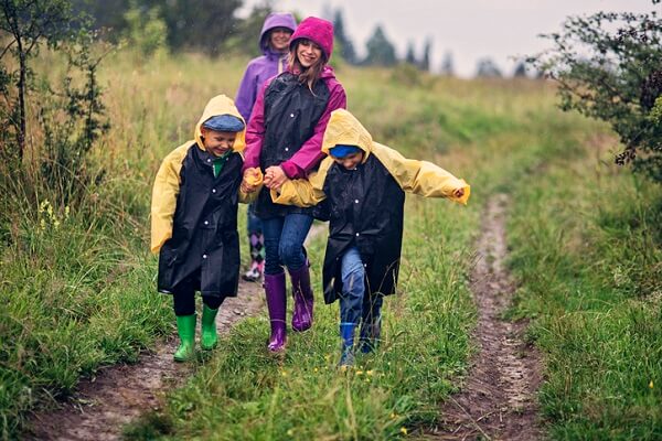 family walking in the rain.jpg